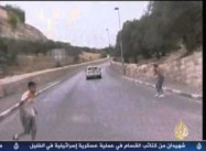 Israeli Settler Runs over Protesting Palestinian Children