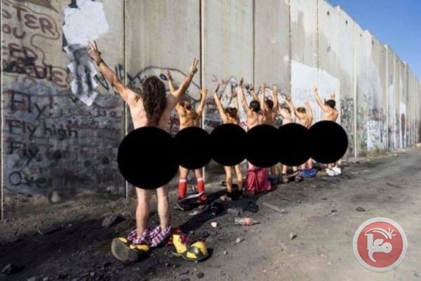 Activists strip against Israeli separation wall in Bethlehem