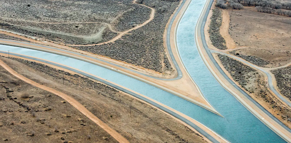Installing solar panels over California’s canals could yield water, land, air and climate payoffs